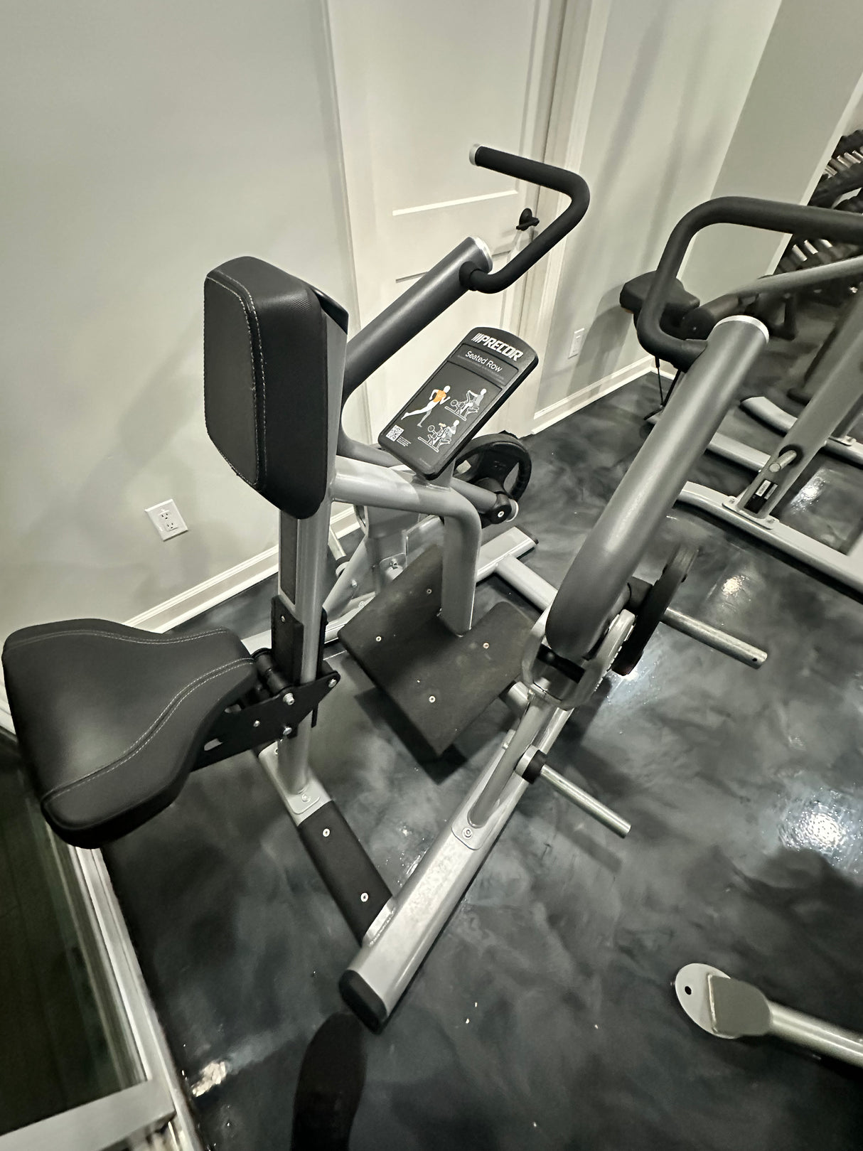 Precor Plate Loaded Seated Row - Like New Condition - Exercise Unlimited